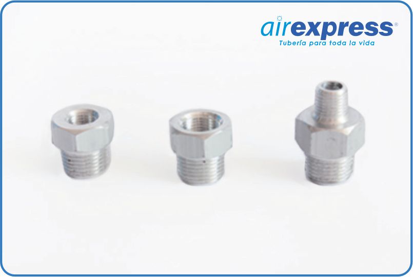 Reducción (Bushing / Niple)